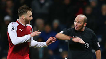 WEST BROMWICH, ENGLAND - DECEMBER 31: Calum Chambers of Arsenal appeals as referee Mike Dean awards a penalty against him during the Premier League match between West Bromwich Albion and Arsenal at The Hawthorns on December 31, 2017 in West Bromwich, England. (Photo by Jan Kruger/Getty Images)