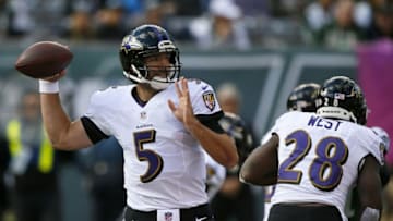 Oct 23, 2016; East Rutherford, NJ, USA; Baltimore Ravens quarterback Joe Flacco (5) attempts to pass against New York Jets during first half at MetLife Stadium. Mandatory Credit: Noah K. Murray-USA TODAY Sports