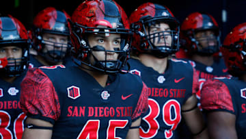 CARSON, CA - NOVEMBER 26: Jesse Matthews #45 of the San Diego State Aztecs walks onto the field against the Boise State Broncos on November 26, 2021 at Dignity Health Sports Park in Carson, California. (Photo by Tom Hauck/Getty Images)