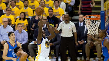 May 16, 2016; Oakland, CA, USA; Golden State Warriors forward Draymond Green (23) shoots against the Oklahoma City Thunder during the third quarter in game one of the Western conference finals of the NBA Playoffs at Oracle Arena. Mandatory Credit: Kelley L Cox-USA TODAY Sports
