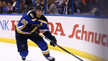 Nov 9, 2016; St. Louis, MO, USA; St. Louis Blues left wing Alexander Steen (20) controls the puck along the boards during the second period against the Chicago Blackhawks at Scottrade Center. Mandatory Credit: Billy Hurst-USA TODAY Sports