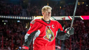 Dec 4, 2014; Ottawa, Ontario, CAN; Ottawa Senators former player Daniel Alfredsson (11) takes part in a pre-game ceremony prior to game against the New York Islanders at Canadian Tire Centre. Mandatory Credit: Marc DesRosiers-USA TODAY Sports