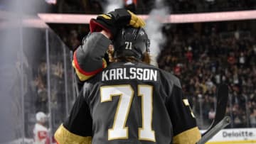 LAS VEGAS, NV - MARCH 23: Reilly Smith #19 of the Vegas Golden Knights celebrates with teammates after scoring a goal during the third period against the Detroit Red Wings at T-Mobile Arena on March 23, 2019 in Las Vegas, Nevada. (Photo by David Becker/NHLI via Getty Images)