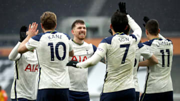 LONDON, ENGLAND - FEBRUARY 07: Harry Kane of Tottenham Hotspur celebrates with team mates Lucas Moura, Pierre-Emile Hojbjerg, Erik Lamela and Son Heung-Min after scoring their side's first goal during the Premier League match between Tottenham Hotspur and West Bromwich Albion at Tottenham Hotspur Stadium on February 07, 2021 in London, England. (Photo by Matt Dunham - Pool/Getty Images)