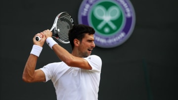 LONDON, ENGLAND - JULY 12: Novak Djokovic of Serbia plays a backhand during the Gentlemen's Singles quarter final match against Tomas Berdych of The Czech Republic on day nine of the Wimbledon Lawn Tennis Championships at the All England Lawn Tennis and Croquet Club on July 12, 2017 in London, England. (Photo by Julian Finney/Getty Images)