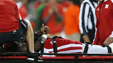Nov 5, 2016; Columbus, OH, USA; Nebraska Cornhuskers quarterback Tommy Armstrong Jr. (4) gives the thumbs up while being carted off the field during the second quarter at Ohio Stadium. Ohio State Buckeyes lead 31-3 at half. Mandatory Credit: Joe Maiorana-USA TODAY Sports