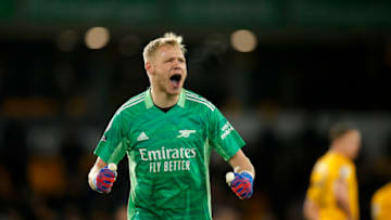 WOLVERHAMPTON, ENGLAND - FEBRUARY 10: Aaron Ramsdale of Arsenal celebrates following the Premier League match between Wolverhampton Wanderers and Arsenal at Molineux on February 10, 2022 in Wolverhampton, England. (Photo by Malcolm Couzens/Getty Images)