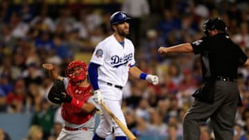 LOS ANGELES, CA - AUGUST 20: Chris Taylor #3 of the Los Angeles Dodgers strikes out as Francisco Pena #46 of the St. Louis Cardinals looks on during the sixth inning of a game at Dodger Stadium on August 20, 2018 in Los Angeles, California. (Photo by Sean M. Haffey/Getty Images)