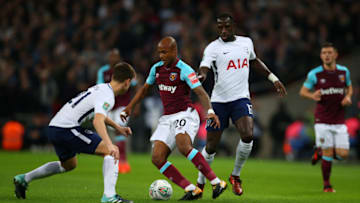 LONDON, ENGLAND - OCTOBER 25: Andre Ayew of West Ham United is marked by Juan Foyth and Moussa Sissoko of Tottenham Hotspur during the Carabao Cup Fourth Round match between Tottenham Hotspur and West Ham United at Wembley Stadium on October 25, 2017 in London, England. (Photo by Catherine Ivill - AMA/Getty Images)