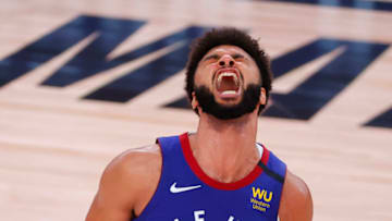 LAKE BUENA VISTA, FLORIDA - AUGUST 30: Jamal Murray #27 of the Denver Nuggets reacts as time expires and the Nuggets win against the Utah Jazz in Game Six of the Western Conference First Round during the 2020 NBA Playoffs at AdventHealth Arena at ESPN Wide World Of Sports Complex on August 30, 2020 in Lake Buena Vista, Florida. NOTE TO USER: User expressly acknowledges and agrees that, by downloading and or using this photograph, User is consenting to the terms and conditions of the Getty Images License Agreement. (Photo by Kevin C. Cox/Getty Images)
