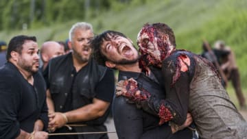 A walker attacks- The Walking Dead _ Season 8, Episode 3 - Photo Credit: Gene Page/AMC