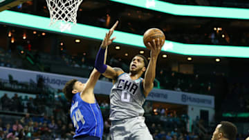 Feb 8, 2020; Charlotte, North Carolina, USA; Charlotte Hornets forward Miles Bridges (0) shoots against Dallas Mavericks forward Justin Jackson (44) during the second half at Spectrum Center. Mandatory Credit: Jeremy Brevard-USA TODAY Sports