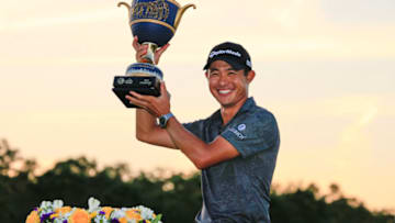 BRADENTON, FLORIDA - FEBRUARY 28: Collin Morikawa of the United States celebrates with the trophy after winning the final round of World Golf Championships-Workday Championship at The Concession on February 28, 2021 in Bradenton, Florida. (Photo by Sam Greenwood/Getty Images)