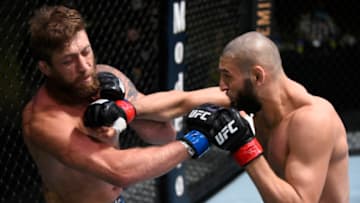 LAS VEGAS, NEVADA - SEPTEMBER 19: (R-L) Khamzat Chimaev of Chechnya punches Gerald Meerschaert in their middleweight bout during the UFC Fight Night event at UFC APEX on September 19, 2020 in Las Vegas, Nevada. (Photo by Chris Unger/Zuffa LLC)