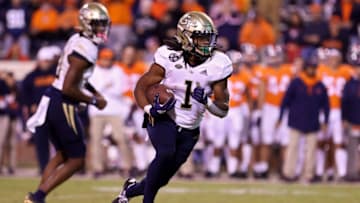 CHARLOTTESVILLE, VA - OCTOBER 23: Jahmyr Gibbs #1 of the Georgia Tech Yellow Jackets rushes during a game against the Virginia Cavaliers at Scott Stadium on October 23, 2021 in Charlottesville, Virginia. (Photo by Ryan M. Kelly/Getty Images)