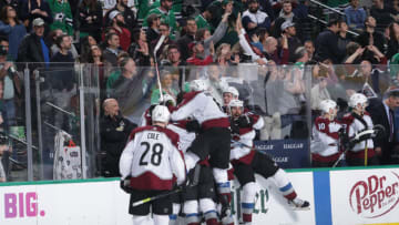 DALLAS, TX - MARCH 21: Erik Johnson #6, Ian Cole #28 and the Colorado Avalanche bench celebrate a goal against the Dallas Stars at the American Airlines Center on March 21, 2019 in Dallas, Texas. (Photo by Glenn James/NHLI via Getty Images)