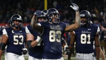 NEW YORK, NY - NOVEMBER 17: Chase Claypool #83 of the Notre Dame Fighting Irish celebrates a touchdown as against the Syracuse Orange during their game at Yankee Stadium on November 17, 2018 in New York, New York. (Photo by Jeff Zelevansky/Getty Images)