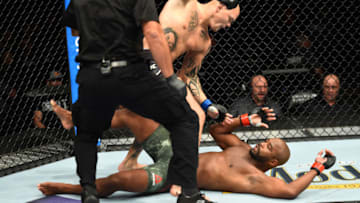 CHICAGO, ILLINOIS - JUNE 09: (L-R) Anthony Smith punches Rashad Evans in their light heavyweight fight during the UFC 225 event at the United Center on June 9, 2018 in Chicago, Illinois. (Photo by Josh Hedges/Zuffa LLC/Zuffa LLC via Getty Images)