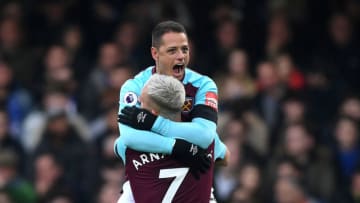 LONDON, ENGLAND - APRIL 08: Javier Hernandez of West Ham United celebrates with team mate Marko Arnautovic of West Ham United after scoring his sides first goal during the Premier League match between Chelsea and West Ham United at Stamford Bridge on April 8, 2018 in London, England. (Photo by Shaun Botterill/Getty Images)