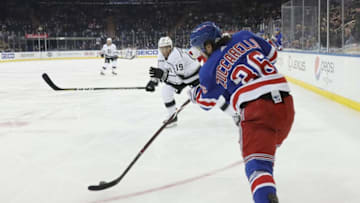 NEW YORK, NEW YORK - FEBRUARY 04: Mats Zuccarello #36 of the New York Rangers looks to shoot the puck out of his own zone during the first period at Madison Square Garden on February 04, 2019 in New York City. (Photo by Bruce Bennett/Getty Images)