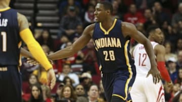 Jan 10, 2016; Houston, TX, USA; Indiana Pacers center Ian Mahinmi (28) celebrates after scoring a basket during the fourth quarter against the Houston Rockets at Toyota Center. Mandatory Credit: Troy Taormina-USA TODAY Sports