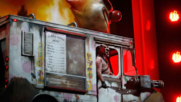 LOS ANGELES, CA - JUNE 15: An evil clown character drives onstage as Sony announces its new version of Twisted Metal for Playstation 3 at the Shrine Theater on opening day of the annual Electronic Entertainment Expo (E3) which is at the Los Angles Convention Center, on June 15, 2010 in Los Angeles, California. The Entertainment Software Association expects 45,000 people to attend the E3 expo featuring more than 250 gaming industry publishers and developers such as Nintendo, Microsoft and Sony. (Photo by David McNew/Getty Images)
