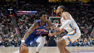 Detroit Pistons center James Wiseman (13) plays the ball and Oklahoma City Thunder center Olivier Sarr (30) defends Credit: Eric Bolte-USA TODAY Sports