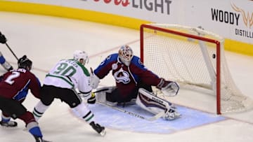 Feb 4, 2016; Denver, CO, USA; Dallas Stars center Jason Spezza (90) scores a goal on Colorado Avalanche goalie Calvin Pickard (31) in the first half at the Pepsi Center. Mandatory Credit: Ron Chenoy-USA TODAY Sports