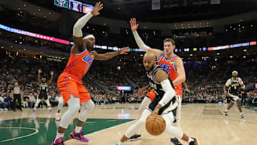 Luguentz Dort #5 and Mike Muscala #33 of the OKC Thunder (Photo by Stacy Revere/Getty Images)
