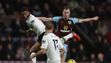 BURNLEY, ENGLAND - JANUARY 01: Trent Alexander-Arnold of Liverpool vies with Ashley Barnes of Burnley during the Premier League match between Burnley and Liverpool at Turf Moor on January 1, 2018 in Burnley, England. (Photo by Ian MacNicol/Getty Images)