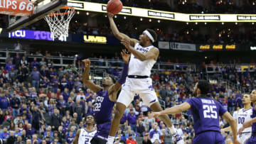 KANSAS CITY, MO - MARCH 14: Kansas State Wildcats forward Xavier Sneed (20) goes high for a finger roll in the second half of a quarterfinal Big 12 tournament game between the TCU Horned Frogs and Kansas State Wildcats on March 14, 2019 at Sprint Center in Kansas City, MO. (Photo by Scott Winters/Icon Sportswire via Getty Images)