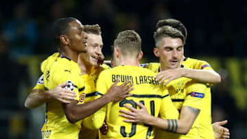 DORTMUND, GERMANY - OCTOBER 03: Marco Reus of Borussia Dortmund celebrates with team mates after scoring his team's third goal during the Group A match of the UEFA Champions League between Borussia Dortmund and AS Monaco at Signal Iduna Park on October 3, 2018 in Dortmund, Germany. (Photo by Maja Hitij/Bongarts/Getty Images,)