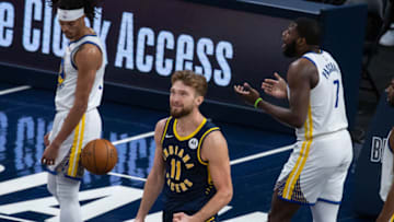 Feb 24, 2021; Indianapolis, Indiana, USA; Indiana Pacers forward Domantas Sabonis (11) reacts to a foul in the fourth quarter against the Golden State Warriors at Bankers Life Fieldhouse. Mandatory Credit: Trevor Ruszkowski-USA TODAY Sports