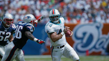 MIAMI - OCTOBER.6: Rob Konrad #44 of the Miami Dolphins carries the ball during the game against the New England Patriots on October 6, 2002 at Pro Player Stadium in Miami, Florida. Dolphins won 26-13. (Photo By Eliot J. Schechter/Getty Images)