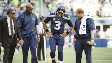 Sep 25, 2016; Seattle, WA, USA; Seattle Seahawks quarterback Russell Wilson (3) reacts after being injured in the third quarter in a game against the San Francisco 49ers at CenturyLink Field. The Seahawks won 37-18. Mandatory Credit: Troy Wayrynen-USA TODAY Sports