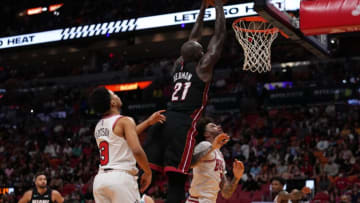 Miami Heat center Dewayne Dedmon (21) dunks the ball over Chicago Bulls guard Lonzo Ball (2) and guard Devon Dotson (3)(Jasen Vinlove-USA TODAY Sports)