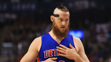 TORONTO, ON - OCTOBER 26: Aron Baynes #12 of the Detroit Pistons gets set to take a free throw during the first half of an NBA game against the Toronto Raptors at Air Canada Centre on October 26, 2016 in Toronto, Canada. NOTE TO USER: User expressly acknowledges and agrees that, by downloading and or using this photograph, User is consenting to the terms and conditions of the Getty Images License Agreement. (Photo by Vaughn Ridley/Getty Images)