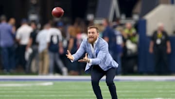 ARLINGTON, TX - OCTOBER 14: Former UFC Champion Conor McGregor plays catch on the field prior to the game between the Jacksonville Jaguars and Dallas Cowboys on October 14, 2018 at AT&T Stadium in Arlington, TX. (Photo by Andrew Dieb/Icon Sportswire via Getty Images)