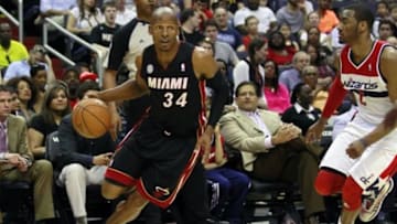 Apr 10, 2013; Washington, DC, USA; Miami Heat shooting guard Ray Allen (34) dribbles the ball as Washington Wizards point guard John Wall (2) defends in the fourth quarter at Verizon Center. The Heat won 103-98. Mandatory Credit: Geoff Burke-USA TODAY Sports