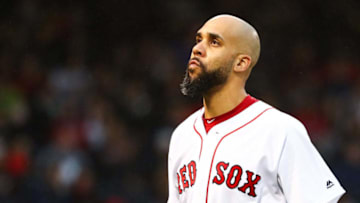 BOSTON, MA - JUNE 13: David Price #10 of the Boston Red Sox reacts as he returns to the dugout after being taken out in the second inning of a game against the Texas Rangers at Fenway Park on June 13, 2019 in Boston, Massachusetts. (Photo by Adam Glanzman/Getty Images)