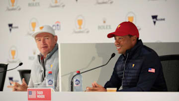 MELBOURNE, AUSTRALIA - DECEMBER 10: Ernie Els of the International team and Tiger Woods of the United States team speak to the media during a captains press conference ahead of the 2019 Presidents Cup at the Royal Melbourne Golf Course on December 10, 2019 in Melbourne, Australia. (Photo by Cliff Hawkins/Getty Images)