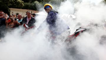 MONTE-CARLO, MONACO - MAY 24: Lewis Hamilton of Great Britain and Mercedes GP performs burnouts on his motorbike during previews ahead of the F1 Grand Prix of Monaco at Circuit de Monaco on May 24, 2019 in Monte-Carlo, Monaco. (Photo by Charles Coates/Getty Images)