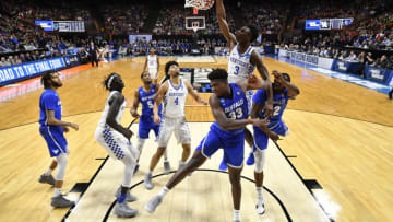 BOISE, ID - MARCH 17: Hamidou Diallo #3 of the Kentucky Wildcats slam dunks over Nick Perkins #33 and Dontay Caruthers #22 of the Buffalo Bulls in the second round of the 2018 NCAA Men's Basketball Tournament held at Taco Bell Arena on March 17, 2018 in Boise, Idaho. (Photo by Brett Wilhelm/NCAA Photos via Getty Images)