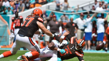 Sep 25, 2016; Miami Gardens, FL, USA; Miami Dolphins defensive end Cameron Wake (91) forces a Cleveland Browns quarterback Cody Kessler (6) to fumble the ball during the first half at Hard Rock Stadium. Mandatory Credit: Jasen Vinlove-USA TODAY Sports