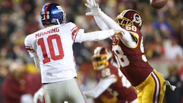 LANDOVER, MD - NOVEMBER 23: New York Giants quarterback Eli Manning (10) gets off a pass as Washington Redskins linebacker Junior Galette (58) closes in during a NFL game between the Washington Redskins and the New York Giants, on November 23, 2017, at Fedex Field, in Landover, Maryland.The Redskins defeated the Giants 20-10.(Photo by Tony Quinn/Icon Sportswire via Getty Images)
