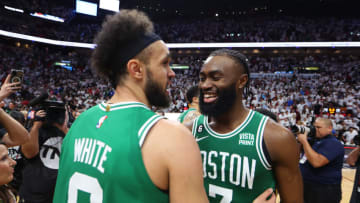 MIAMI, FLORIDA - MAY 27: Derrick White #9 and Jaylen Brown #7 of the Boston Celtics react after defeating the Miami Heat 104-103 in game six of the Eastern Conference Finals at Kaseya Center on May 27, 2023 in Miami, Florida. NOTE TO USER: User expressly acknowledges and agrees that, by downloading and or using this photograph, User is consenting to the terms and conditions of the Getty Images License Agreement. (Photo by Mike Ehrmann/Getty Images)