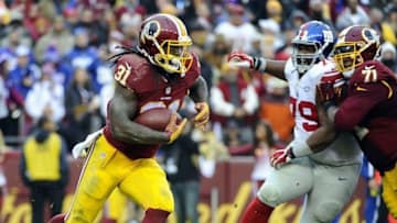 Nov 29, 2015; Landover, MD, USA; Washington Redskins running back Matt Jones (31) rushes the ball against the New York Giants during the second half at FedEx Field. Washington Redskins won 20 - 14. Mandatory Credit: Brad Mills-USA TODAY Sports