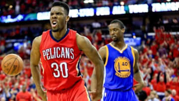 Apr 23, 2015; New Orleans, LA, USA; New Orleans Pelicans guard Norris Cole (30) reacts after scoring against the Golden State Warriors during the fourth quarter in game three of the first round of the NBA Playoffs at the Smoothie King Center. The Warriors defeated the Pelicans 123-119 in overtime. Mandatory Credit: Derick E. Hingle-USA TODAY Sports