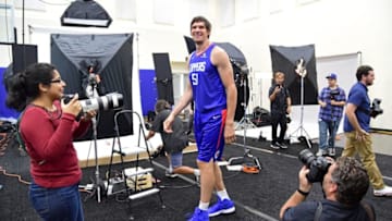 PLAYA VISTA, CA - SEPTEMBER 24: Boban Marjanovic #51 of the Los Angeles Clippers walks through different photo stations on media day at the Los Angeles Clippers Training Center on September 24, 2018 in Playa Vista, California. (Photo by Jayne Kamin-Oncea/Getty Images) NOTE TO USER: User expressly acknowledges and agrees that, by downloading and or using this photograph, User is consenting to the terms and conditions of the Getty Images License Agreement.
