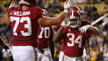 BATON ROUGE, LA - NOVEMBER 03: Damien Harris #34 of the Alabama Crimson Tide celebrates a second half touchdown with Jonah Williams #73 while playing the LSU Tigers at Tiger Stadium on November 3, 2018 in Baton Rouge, Louisiana. (Photo by Gregory Shamus/Getty Images)